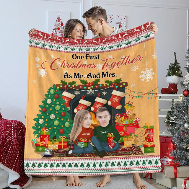Mr and Mrs first Christmas fireplace blanket held by couple