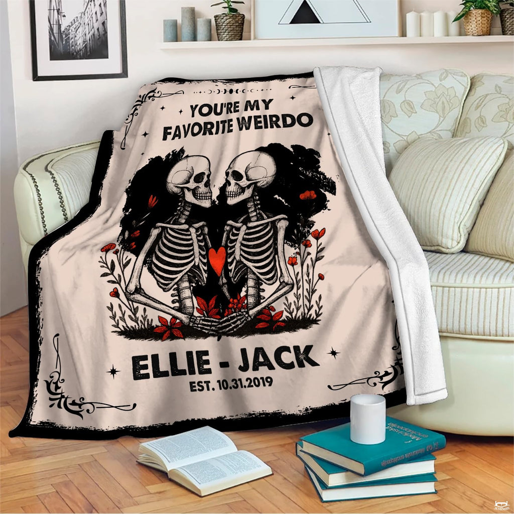 Close up view of lovers skeleton artwork holding a small crimson heart on thematic accent parchment.