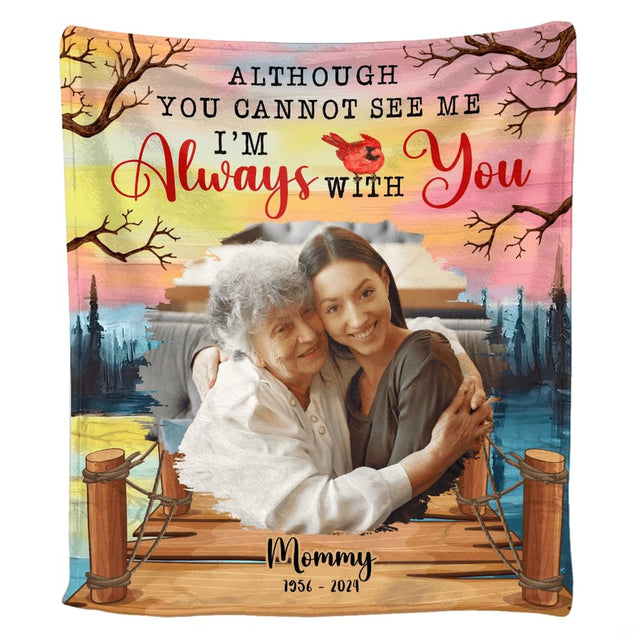 Sunset dock sympathy throw blanket styled across a living room sofa