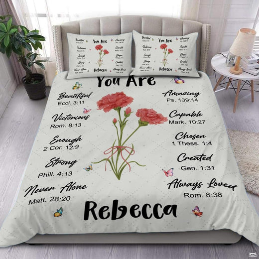 You Are Wildflower Christian scripture botanical bedding set displayed neatly on a bed in a bright bedroom