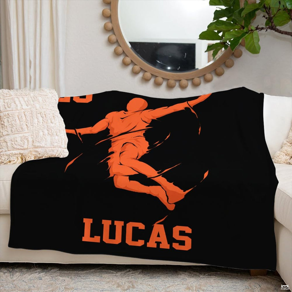 thematic accent-contrast orange court action illustration on black bedding set centerpiece.