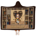 Illustrated vintage bookshelf bed set print showing rows of antique leatherbound novels on warm wooden shelves.