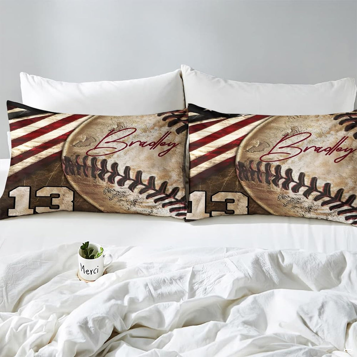 Side angle view of athletic sports bedding showing rustic rust red and sand khaki tones draped on mattress