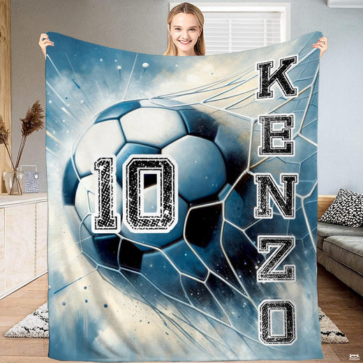Soccer bedding set displaying dynamic goal net strike illustration with blue impact splatters.