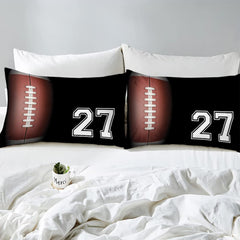 Corner fold view of football bedding highlighting sharp graphic printing on dark background