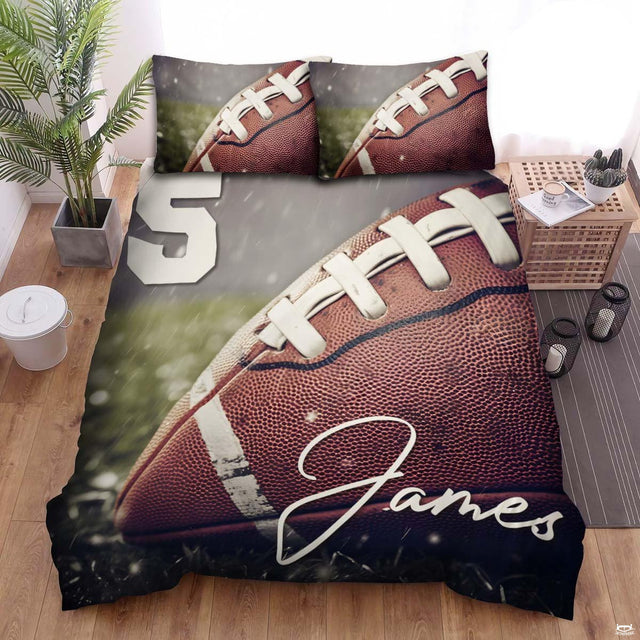 Football bedding displaying macro close-up of football with white laces resting on green stadium turf