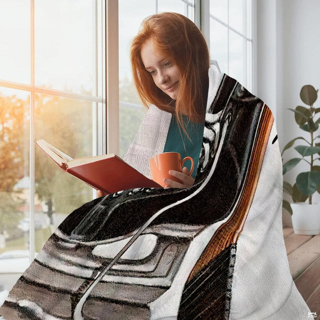 Detailed ice hockey skate graphic blanket draped over sofa