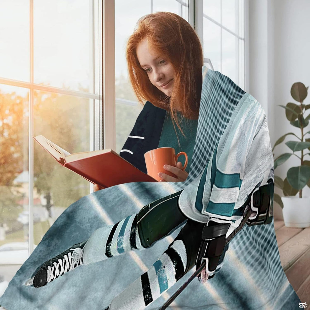 Youth hockey skater graphic blanket draped across living room couch
