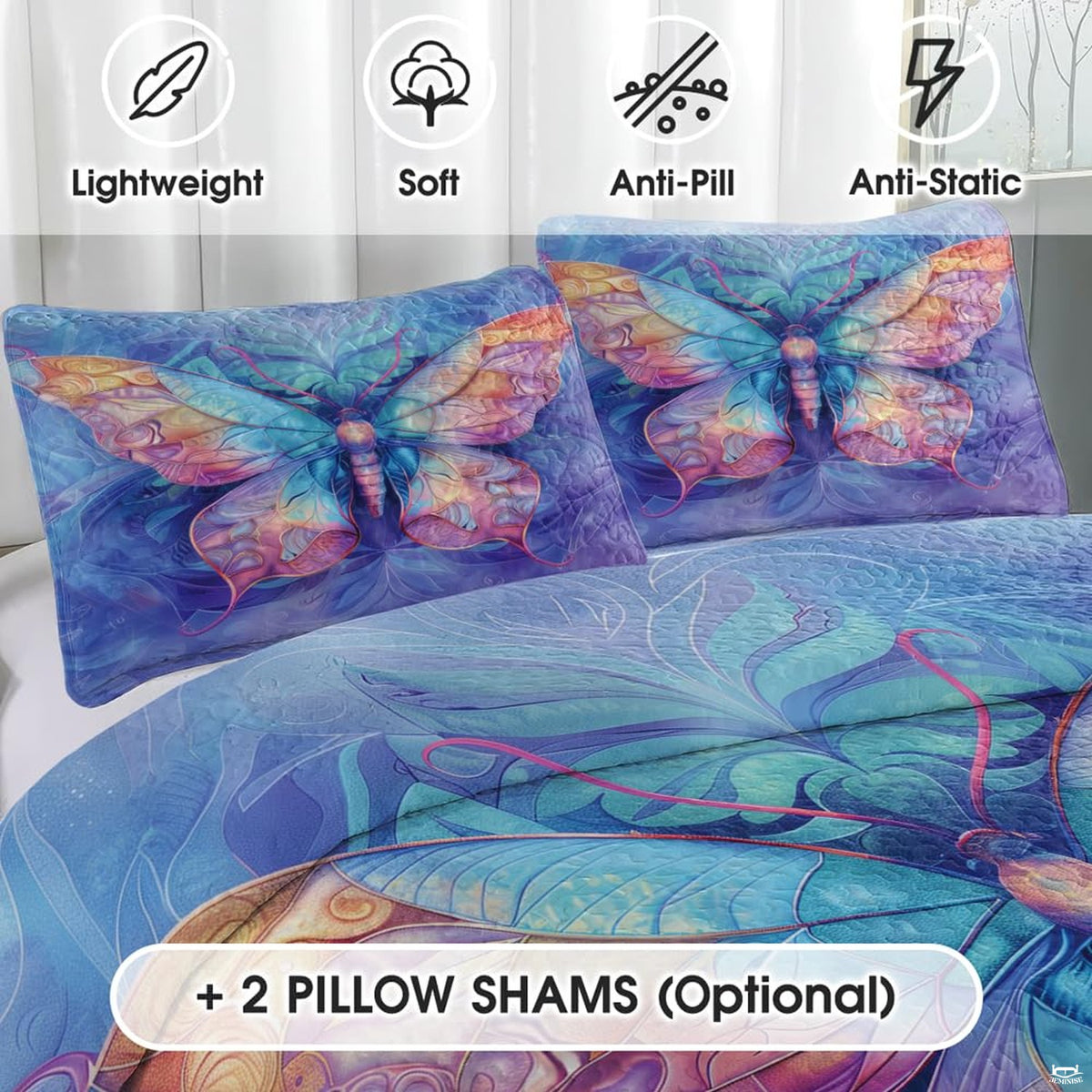 Close-up detail of botanical patchwork bedding displaying stylized butterfly wings, floral petals, and periwinkle accents.