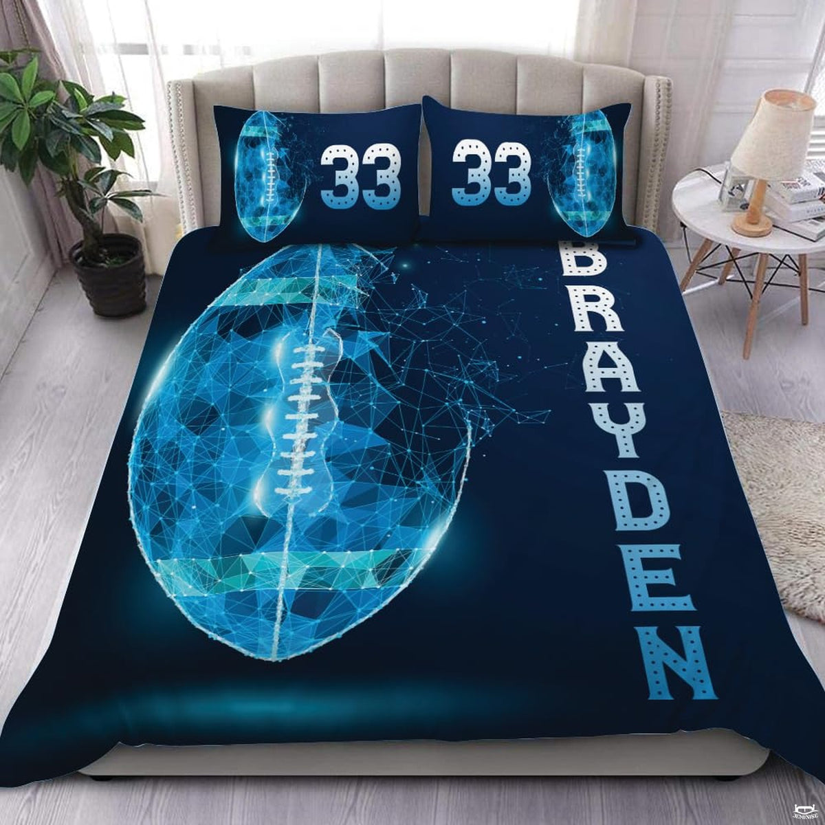 Electric teal football sports bedding featuring textured football graphic and yard lines on a bed