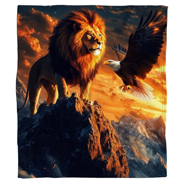 Majestic lion atop an alpine precipice overlooking glowing orange sunset mountain clouds.
