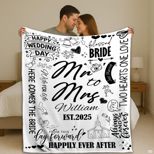 Miss to Mrs doodle wedding throw blanket held open by couple