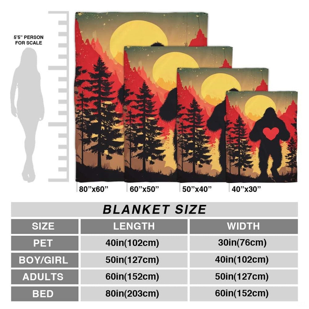 Bigfoot holding heart throw blanket view 4 highlighting Sasquatch silhouette, scarlet heart, and sunset sky