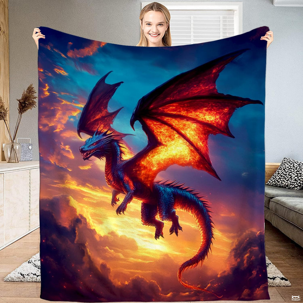 Fiery sunset sky soaring dragon fantasy blanket showing winged beast and glowing clouds view 1