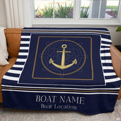 Coastal bedroom arrangement highlighting the navy blue and gold nautical centerpiece.