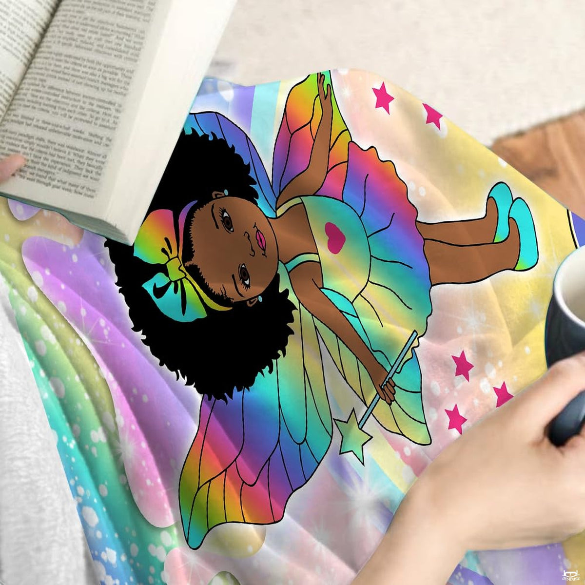 Artistic detail of pastel rainbow clouds and twinkling celestial stars on whimsical bedding.