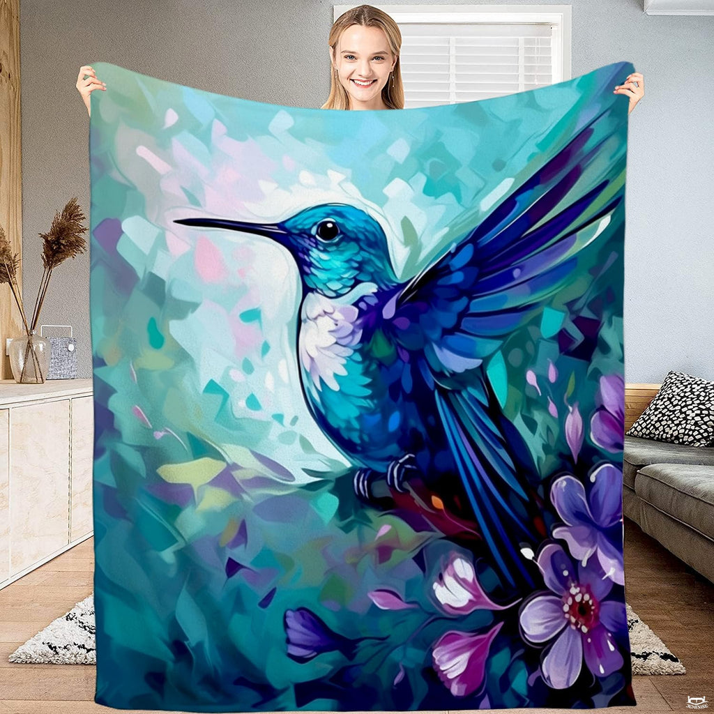 Turquoise hummingbird garden throw blanket featuring painted blue hummingbird on branch with violet blossoms