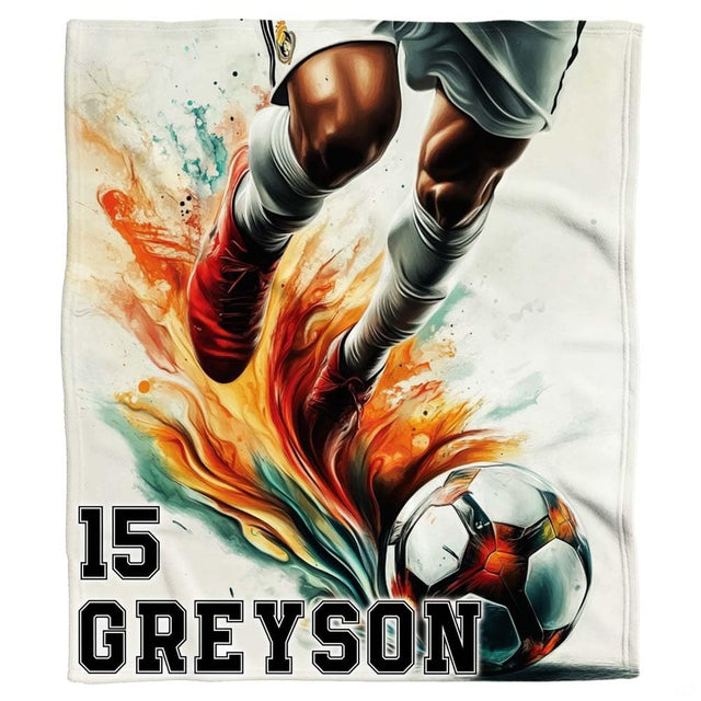 Watercolor soccer kick graphic textile laid flat in studio overview