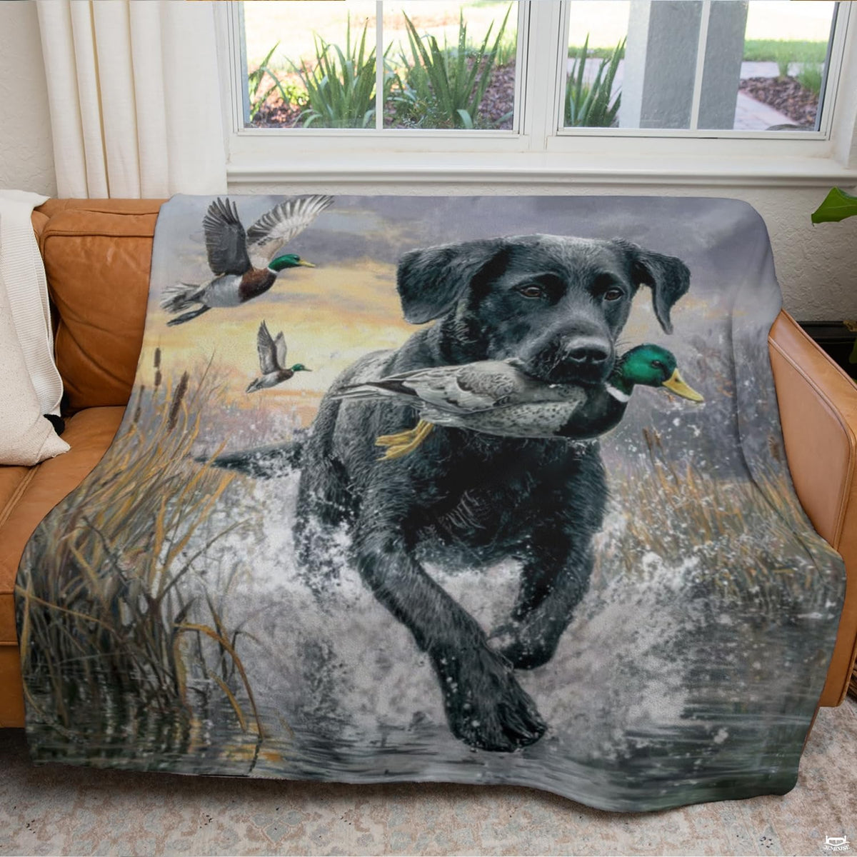 Waterfowl hunting scene showing splashing marsh waters, wild cattails, and an energetic retriever on bedding.