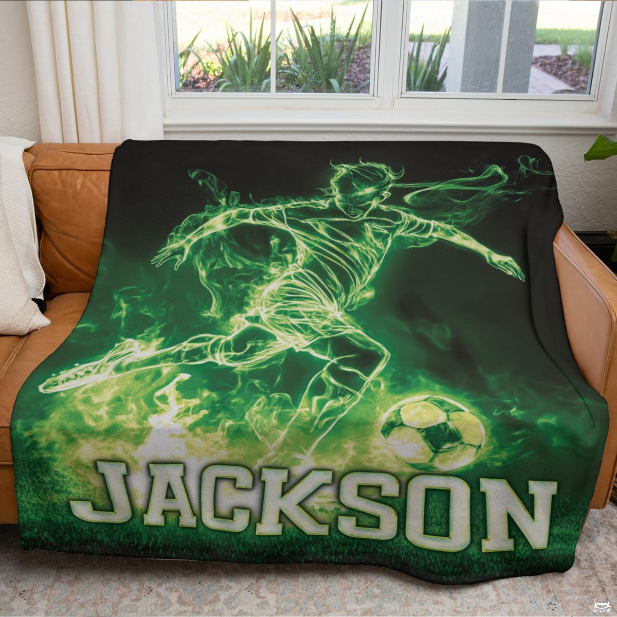 Athletic soccer ball and neon vapor design accentuating vibrant boys sports bedroom ideas.