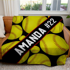 Full flat graphic layout of floating softballs diagonal sash sports throw blanket.