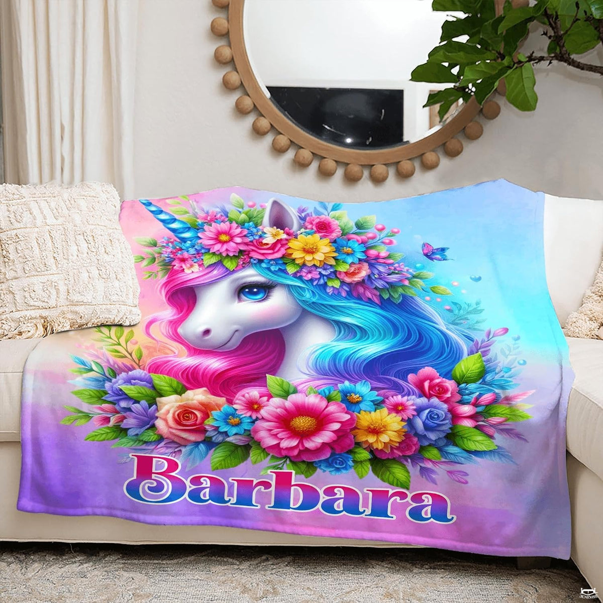 Pastel floral unicorn throw blanket styled across contemporary bed in whimsical girls bedroom