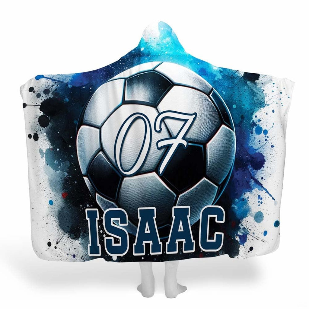 Dynamic soccer ball artwork on mid century modern bedding set with blue watercolor splatters.