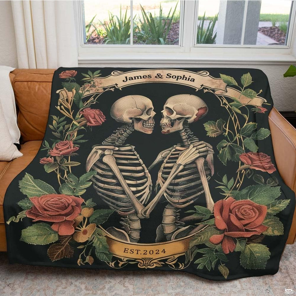 Gothic skeleton couple throw blanket view 3 highlighting embracing skeletons, blooming roses, and banner accents