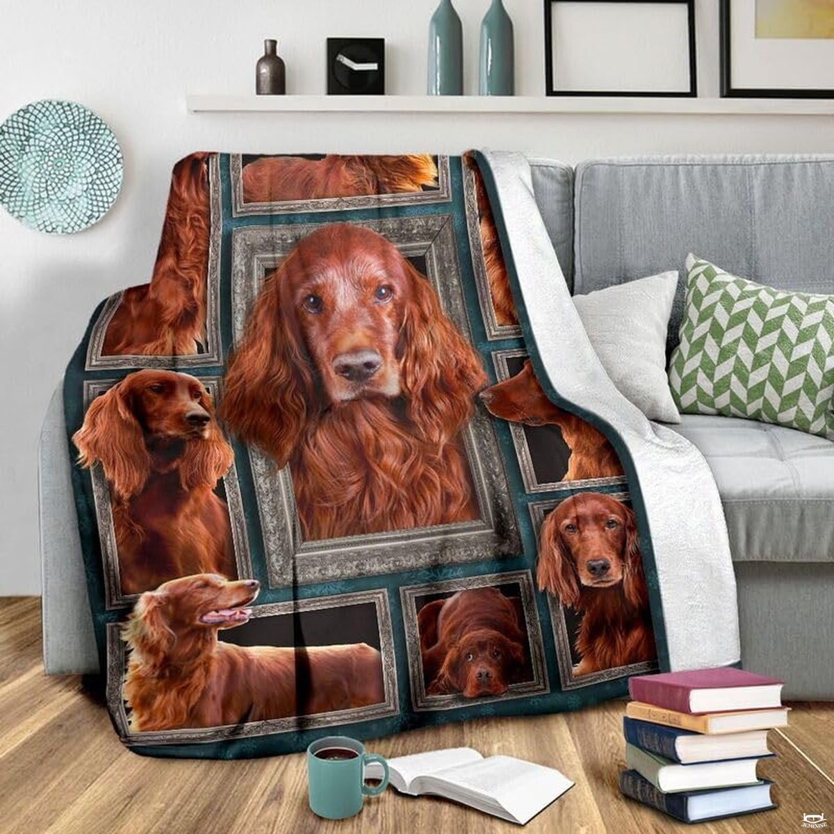 Grey couch arrangement featuring the Irish Setter blanket draped beside patterned pillows.