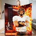 Gridiron player blazing fire sports blanket held upright by model