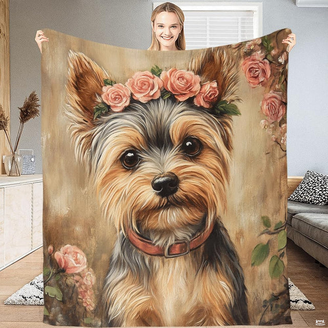 Living room sofa display showing the floral Yorkshire Terrier throw blanket draped over furniture.