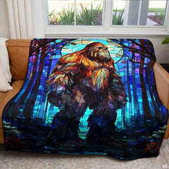 Full flat lay of the stained glass Bigfoot mosaic art blanket.