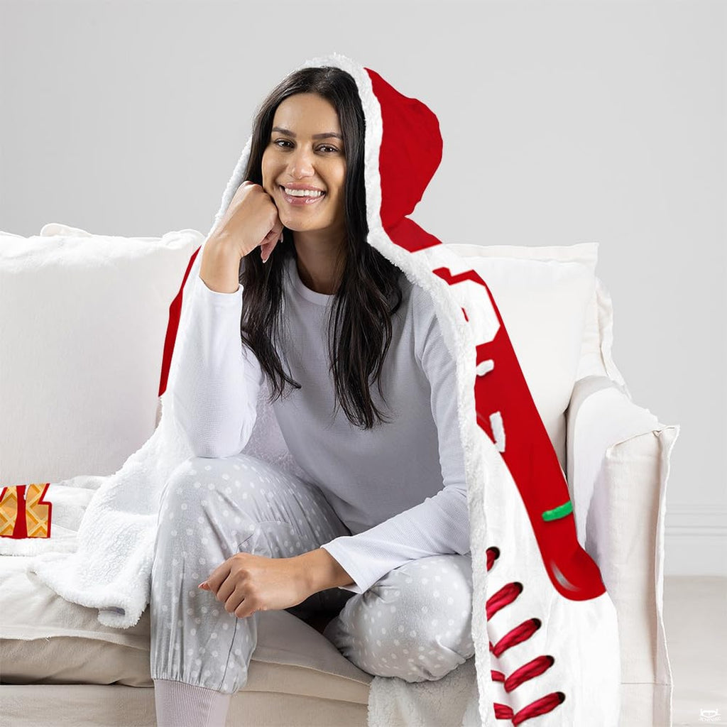 Folded corner view of baseball hooded blanket showing red drip icing