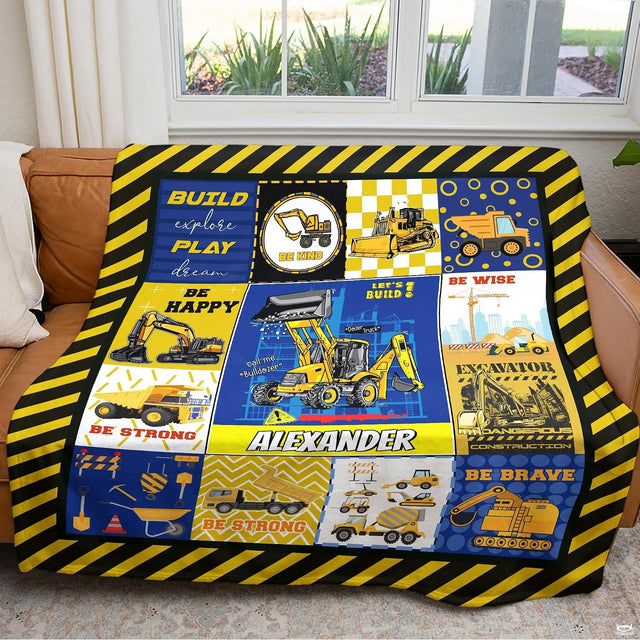 Kids digger bedding displaying bold thematic accent vehicle graphics with hazard caution stripes.
