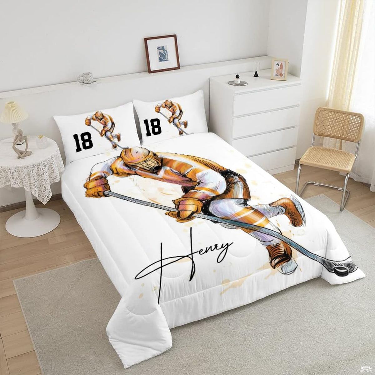 Close-up perspective of hockey bedding highlighting goalie silhouette, ice spray effects, and equipment graphics