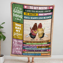 Frontal view held upright displaying two companions in winter knitwear framed by colorful wooden signboards.