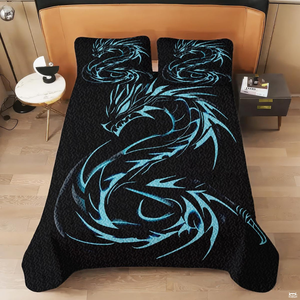 Overhead view of blue dragon bedding artwork with a long coiled silhouette