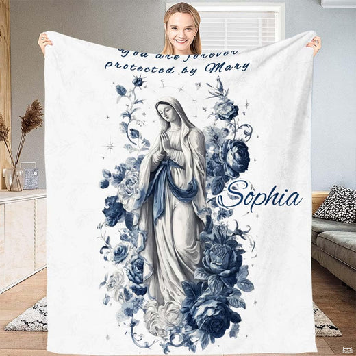 Blessed Mother blanket displaying praying Virgin surrounded by deep blue roses on white.
