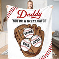 Full view of throw blanket displaying tan baseball mitt, three baseballs, and red corner lacing tracks.