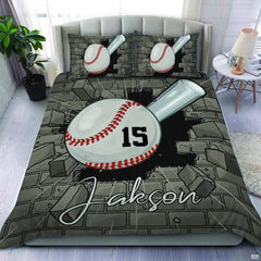 Sage green and charcoal baseball athletic sports bedding set displayed on a bed in a modern room