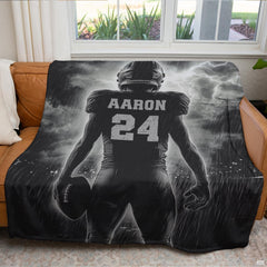 Football athlete graphic drape arranged across living room sofa