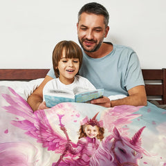 Father and child reading storybook in bed covered by pink unicorn blanket