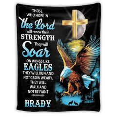 Graphic print showing a golden Christian cross, flying raptor bird, lunar glow, and howling wolves.