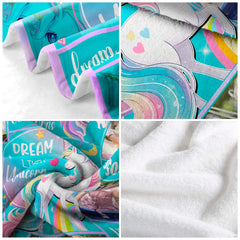 Four quadrant detail showing printed unicorn graphic corner, hem fold, and plush backing.
