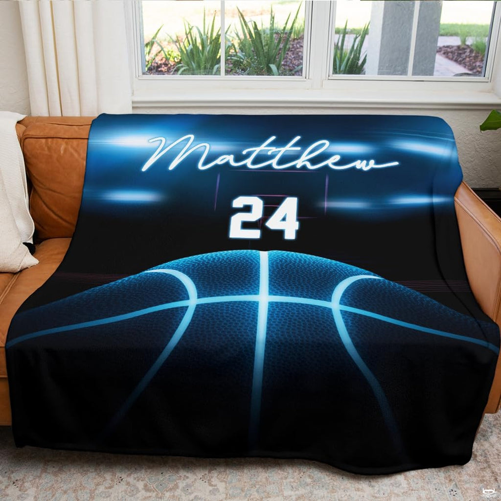 Sports lounge and gaming setup featuring glowing blue basketball throw blanket