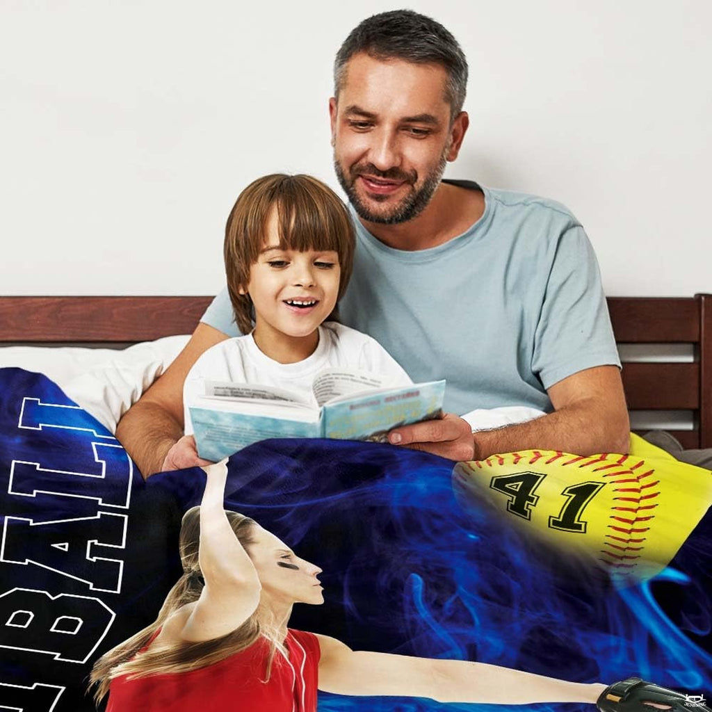 Adult and child reading in bed draped in vibrant blue smoke sports design.