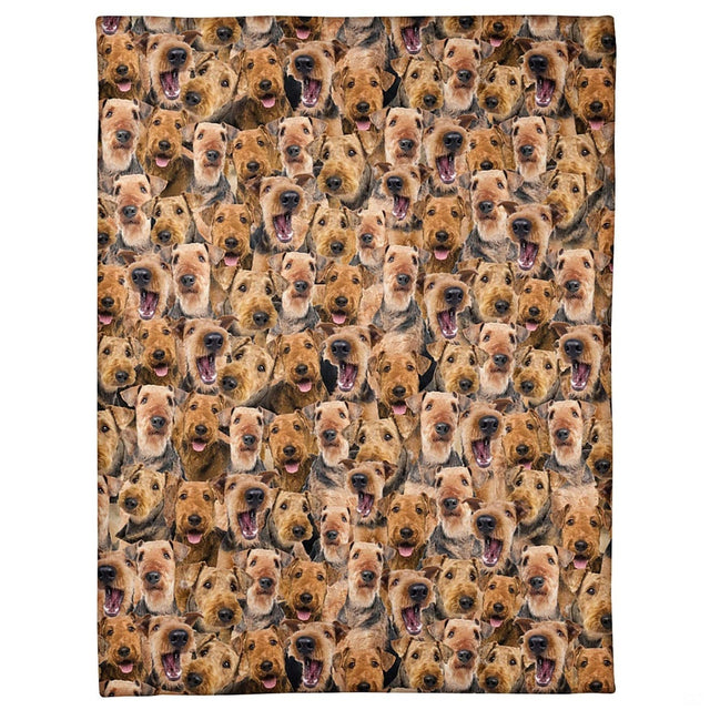 All-over pattern display showing a dense photo collage of smiling Airedale Terrier portraits.