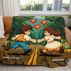 Close up of pixel art throw blanket highlighting 8-bit character mosaic pixels and woodland trees