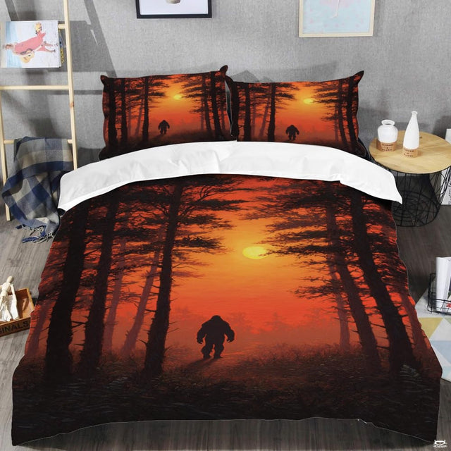 Top angle perspective of bigfoot silhouette bedding showing detailed striped sunset rings and pine tree accents.