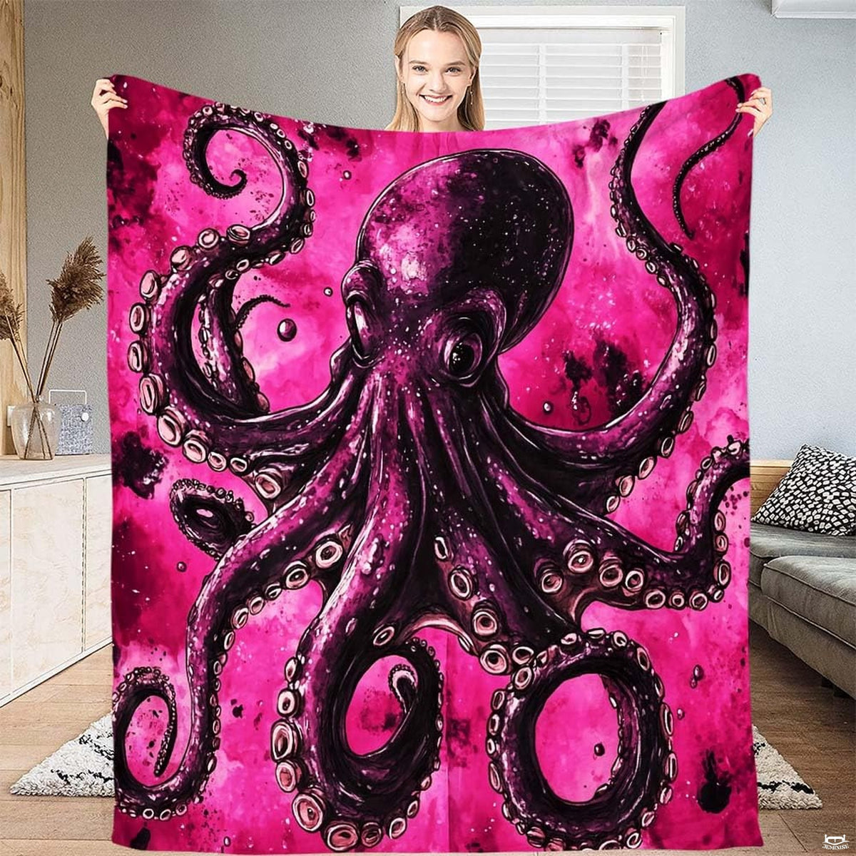 Lifestyle view showing cosmic pink watercolor kraken octopus design held open.